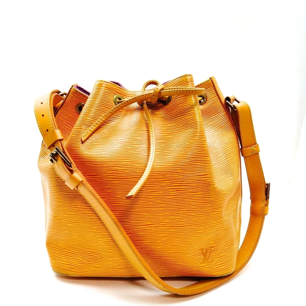 Vibrant Yellow Leather Shoulder Bag with Drawstring Closure